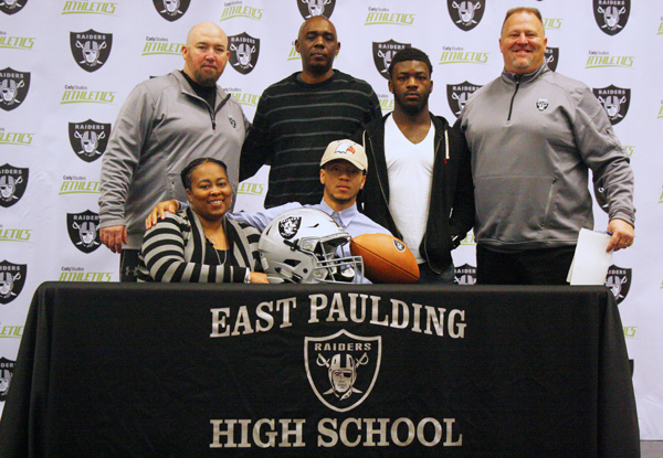 Terrance with Coaches and Family